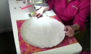 Sewing the bottom of the pouf on