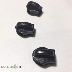 Black-zipper-stops-in-a-row