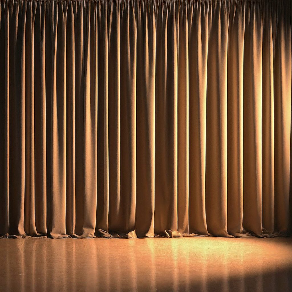 a perfectly installed pipe and drape backdrop with smooth, even draping
