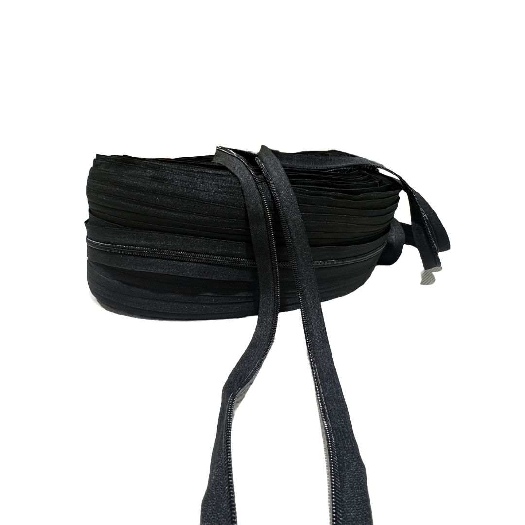 #5 black zipper coil roll – durable zipper tape for bags, upholstery, and outdoor gear.